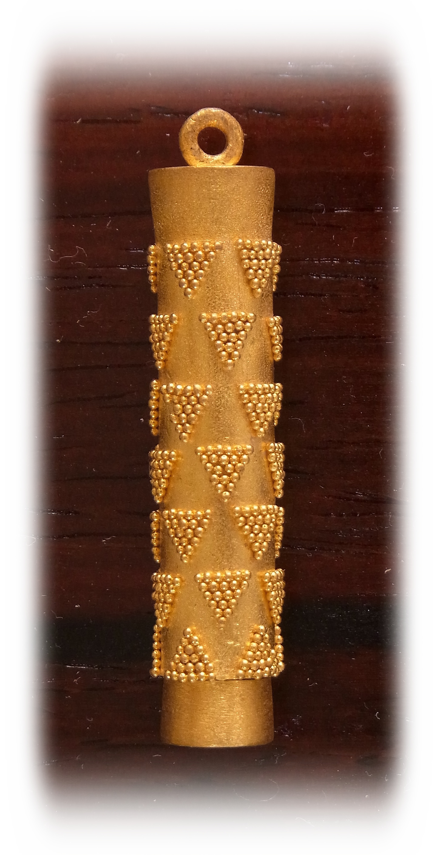 Cylindrical Gold Amulet with granulation