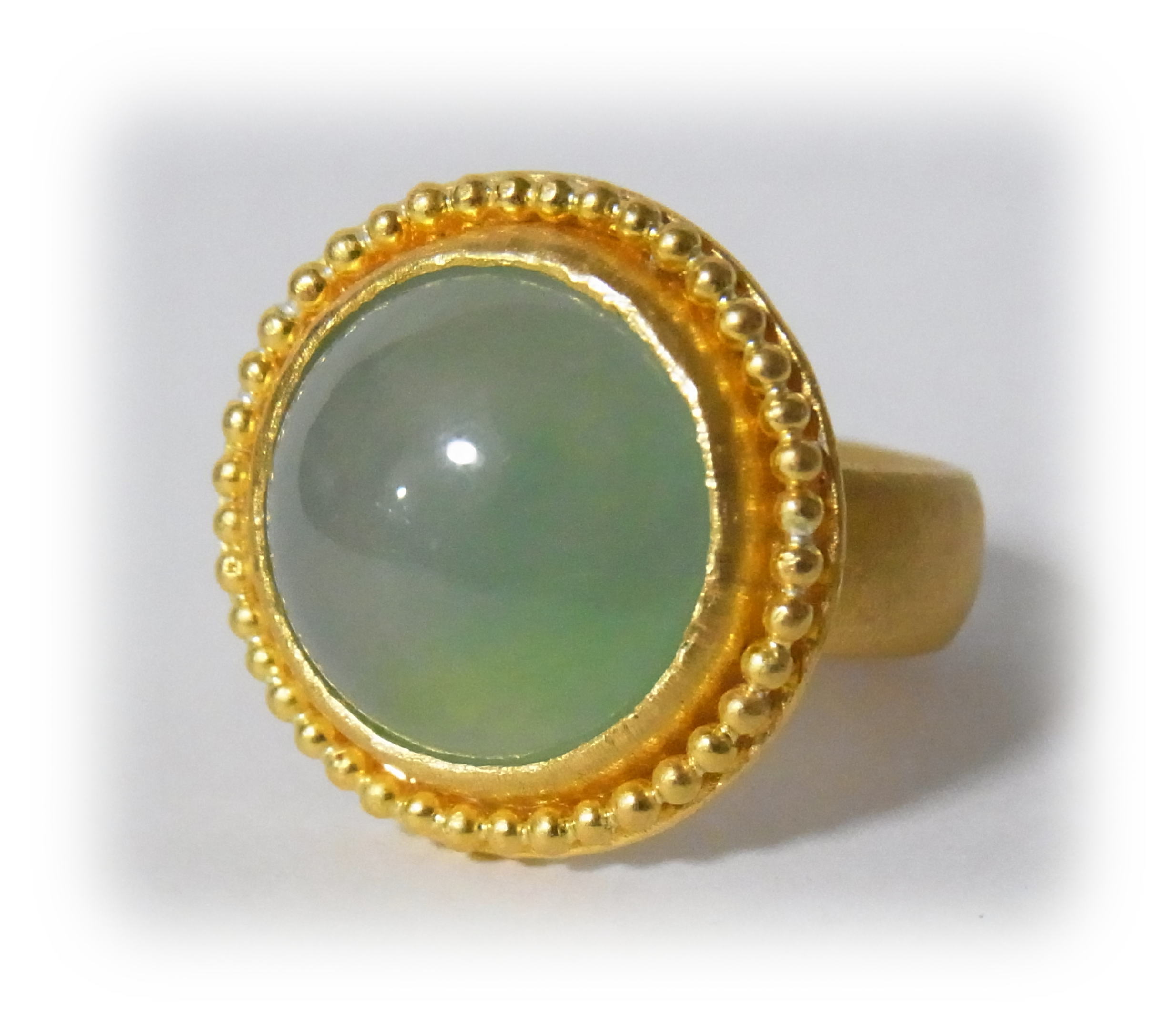 Round-cabochon green Jadeite ring with gold granulation