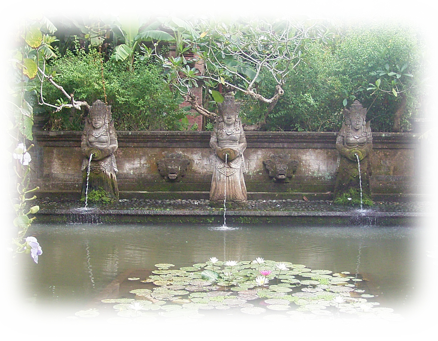 Arma Resort Hotel of Ubud, Bali: three Goddesses pouring water into the bathing pond