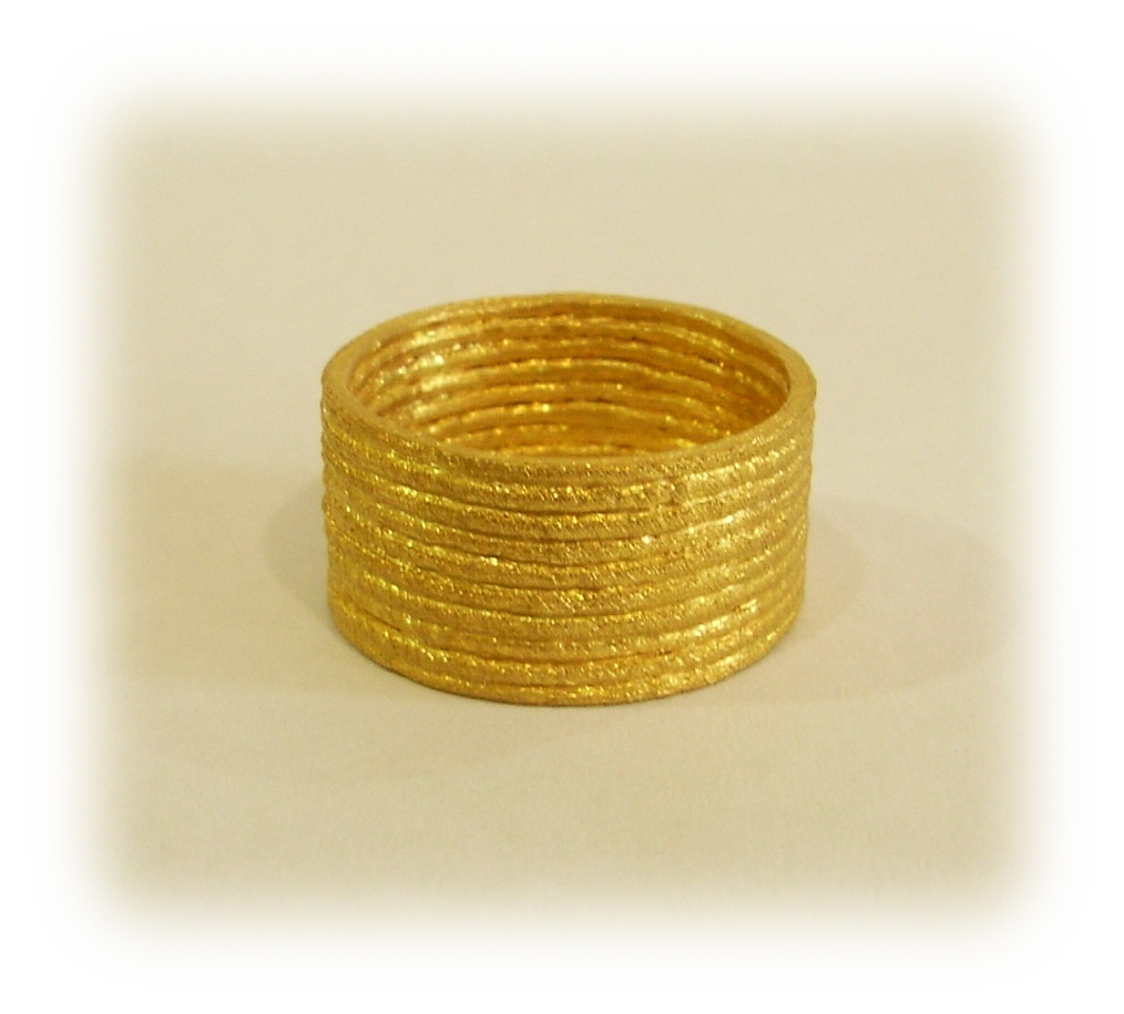 純金で作ったリボンの指輪