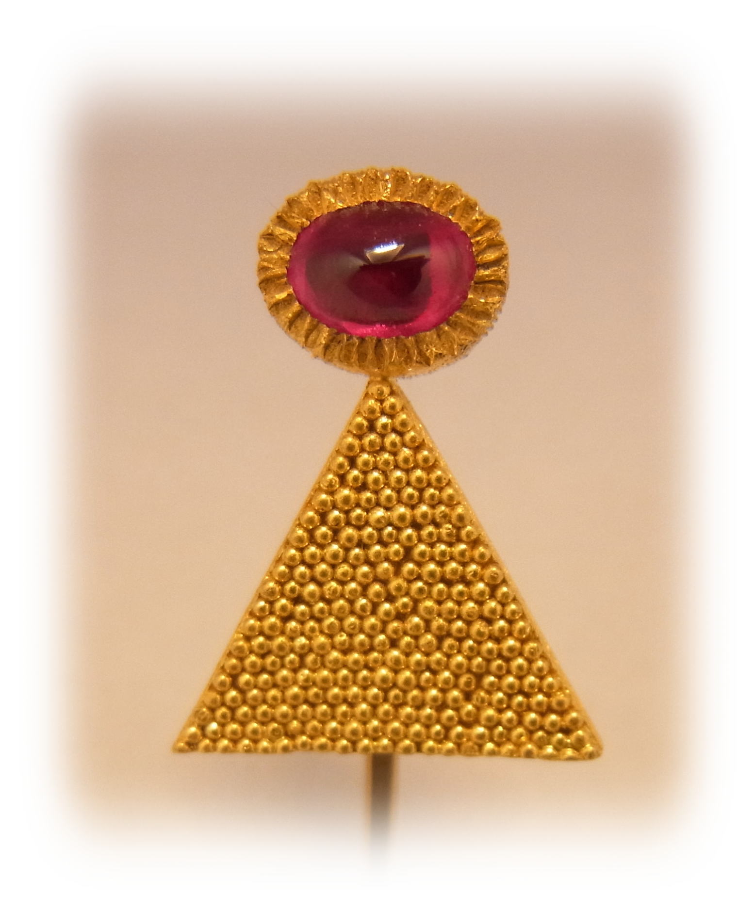 Gold granulation brooch with Ruby